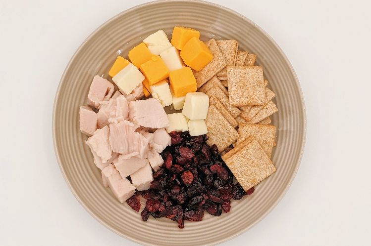 Turkey and Cheese Bites with Cranberries, a fresh kids meal from Meal Village.