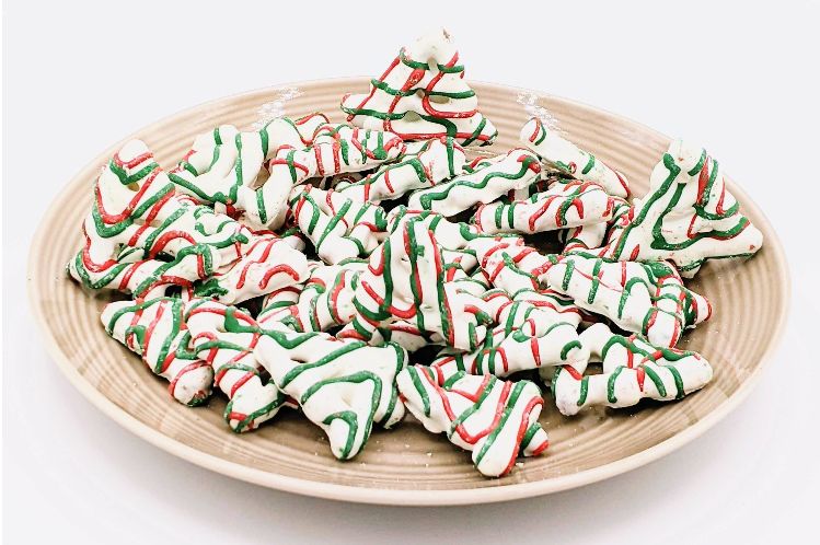 Tree-shaped yogurt-coated pretzels, a sweet and salty snack.