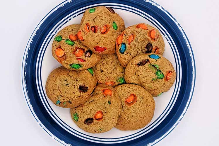 Fresh cookies with colorful M and Ms baked inside.